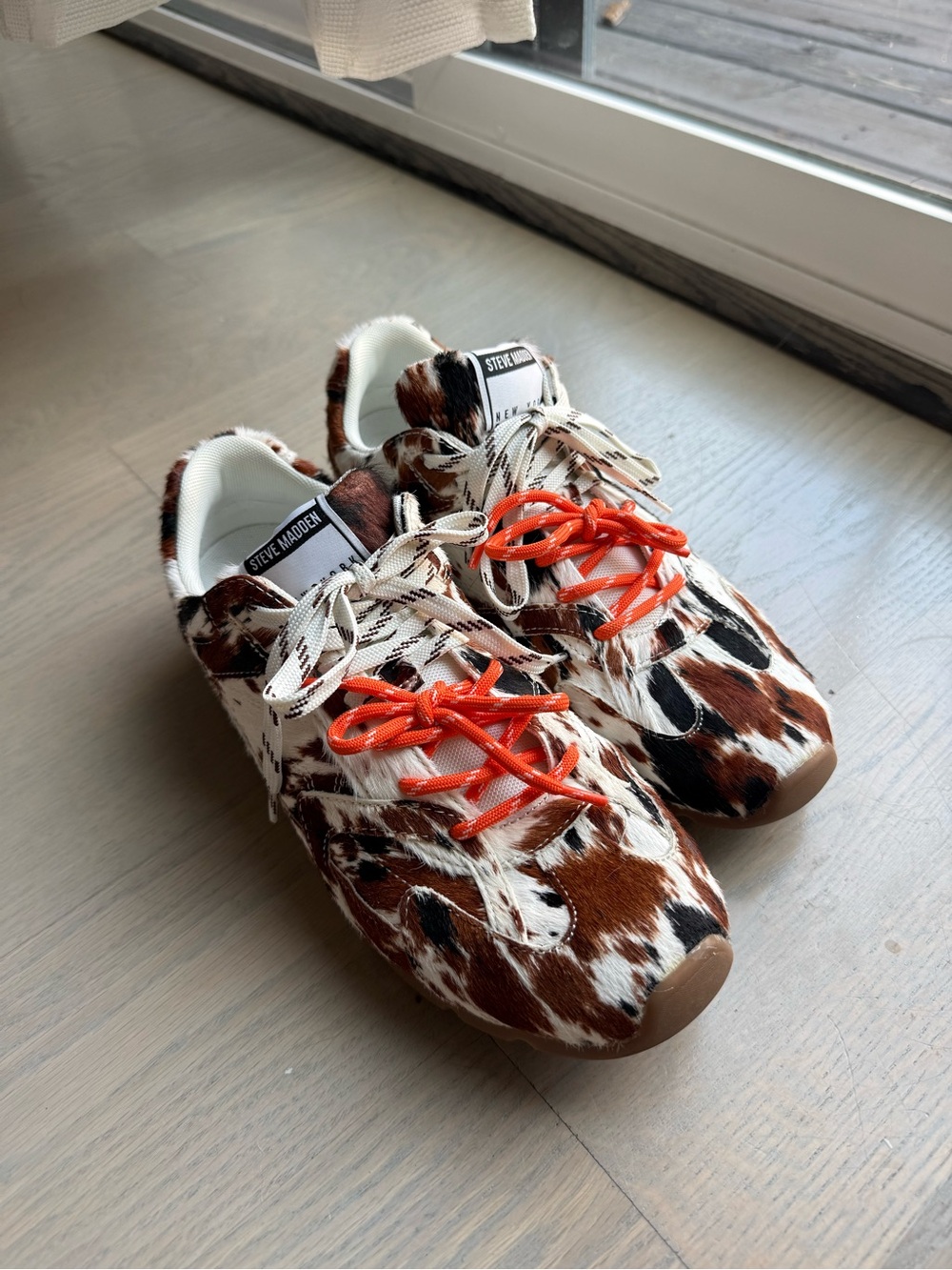 Steve Madden Brown and White Cowprint Sneakers with Orange Laces